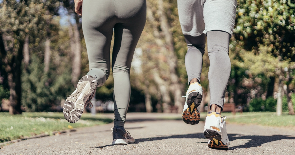 Active adult walking outdoors after hip replacement, illustrating safe return to everyday activities after hip replacement